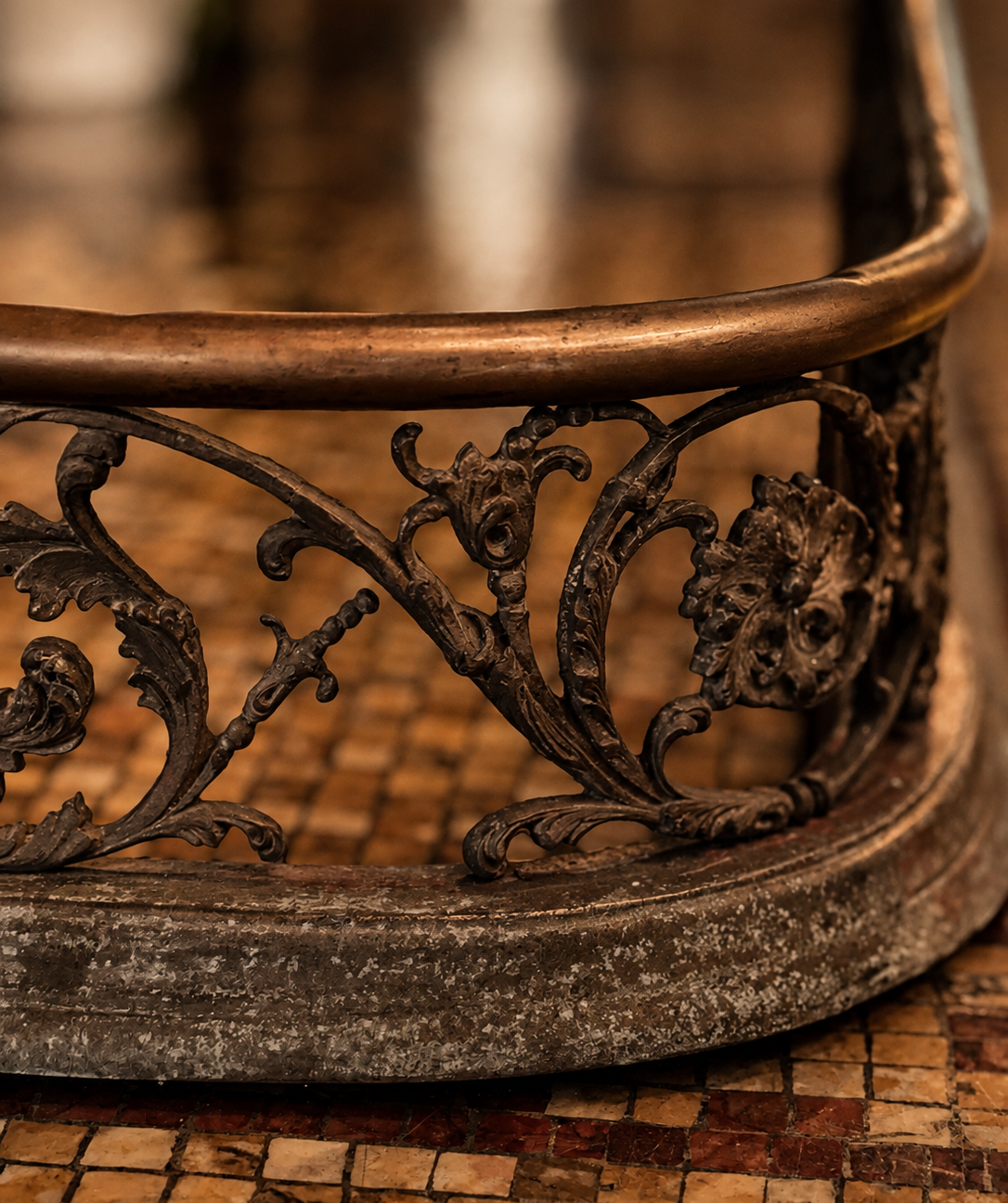 metal railing with a curved bronze - dr-kilmers